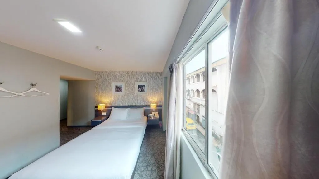 Bed in Kosma Boutique Hotel