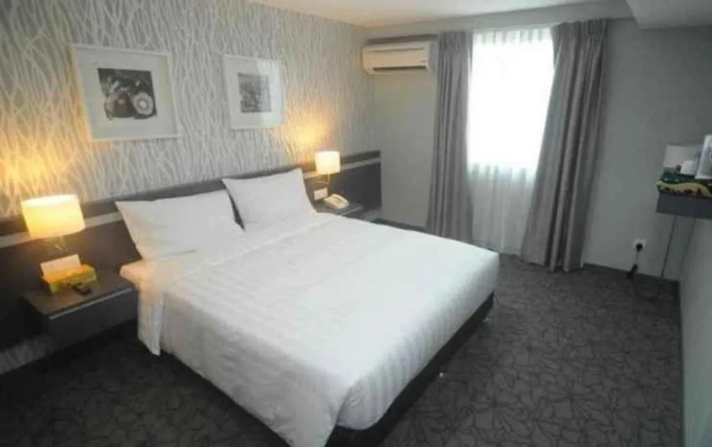 Bed in Kosma Boutique Hotel