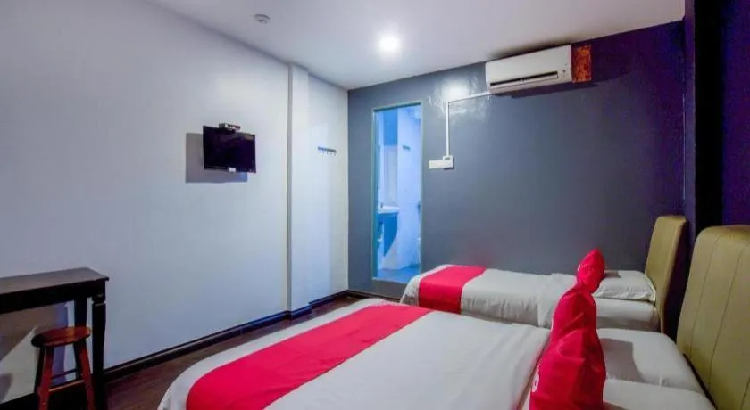 Bed in OYO 89895 Senses Budget Hotel