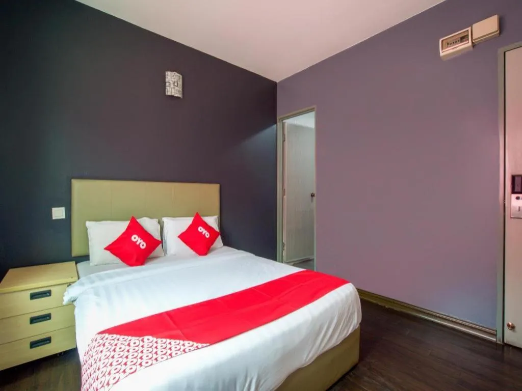 Bed in OYO 89895 Senses Budget Hotel