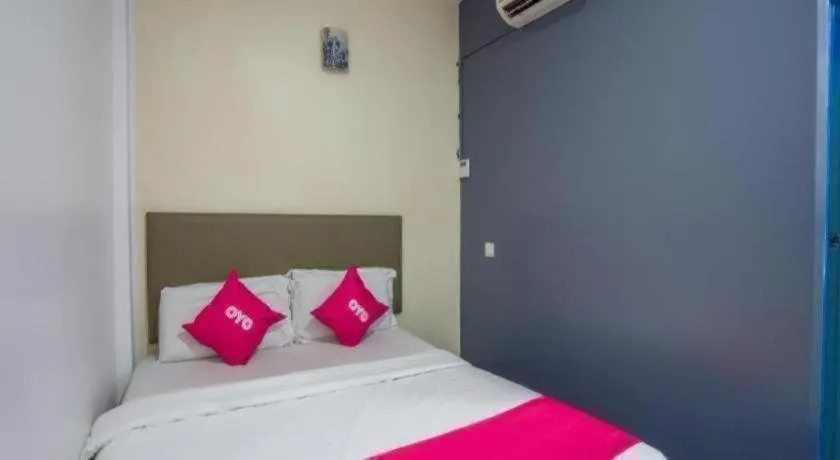 Bed in OYO 89895 Senses Budget Hotel