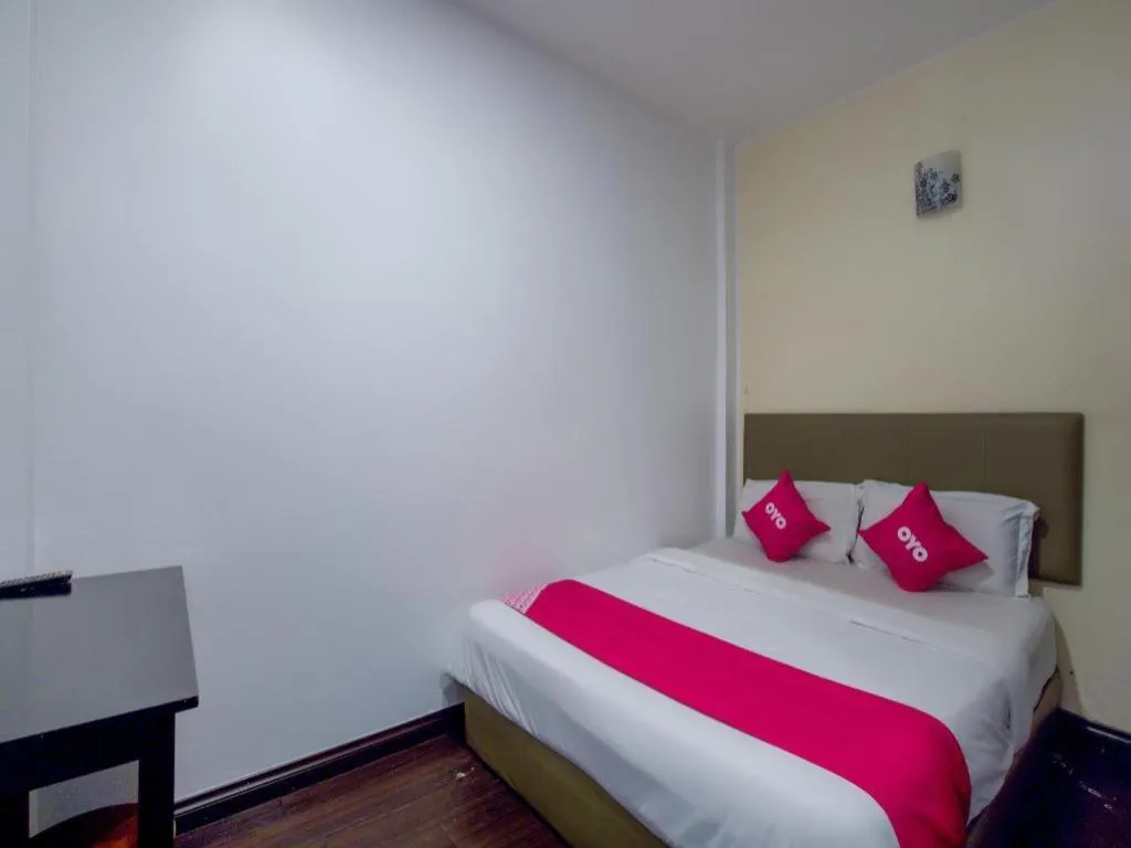 Bed in OYO 89895 Senses Budget Hotel