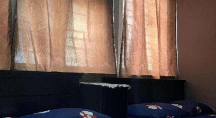 Bed in Sun Golden Inn