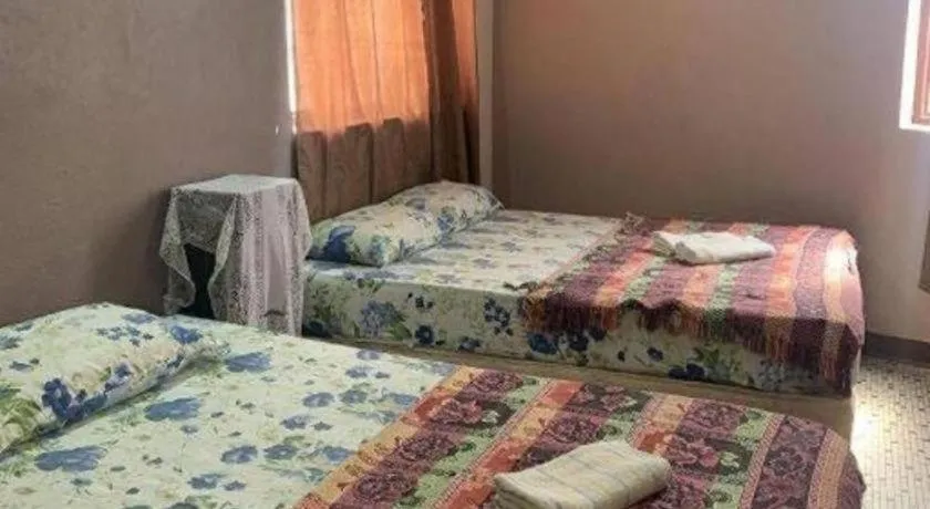 Bed in Sun Golden Inn