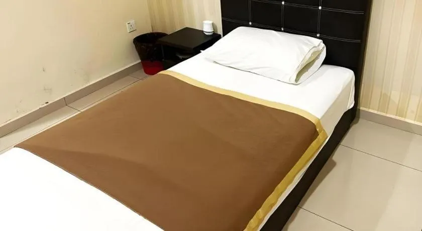 Bed in RST Hotel