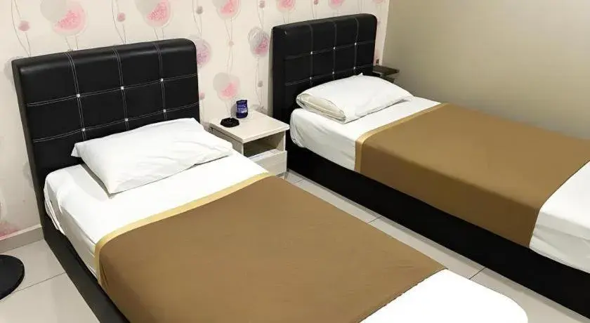 Bed in RST Hotel Bed in RST Hotel