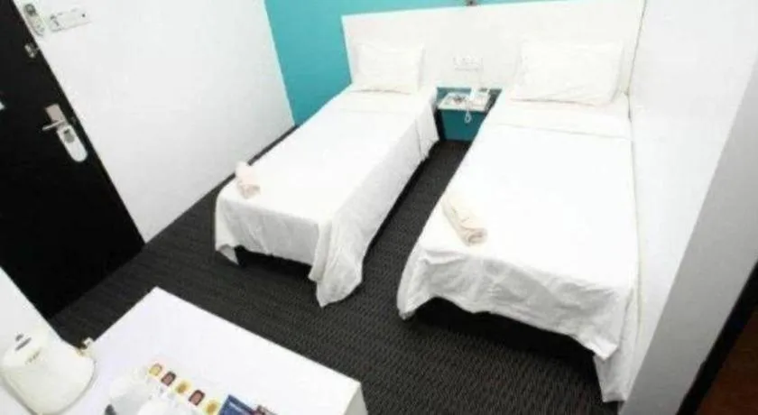 Bed in Capital O Ridel Hotel Kota Bharu