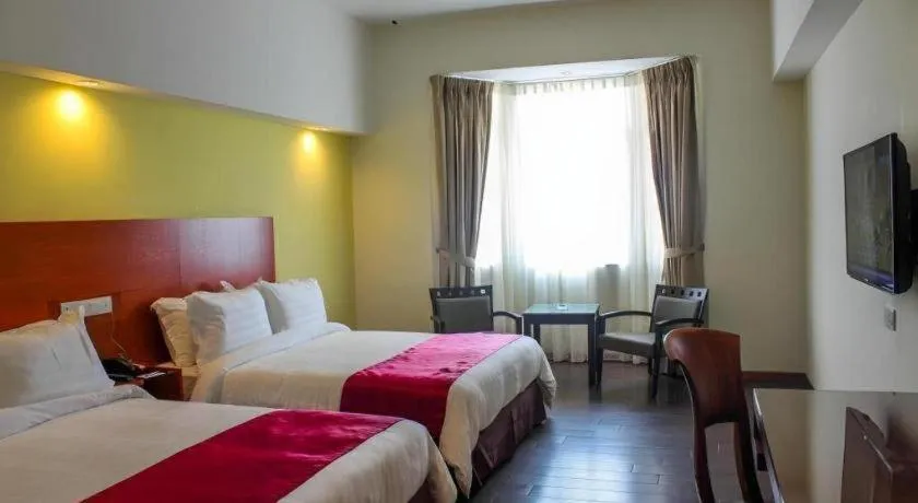 Bed in Palm Seremban Hotel