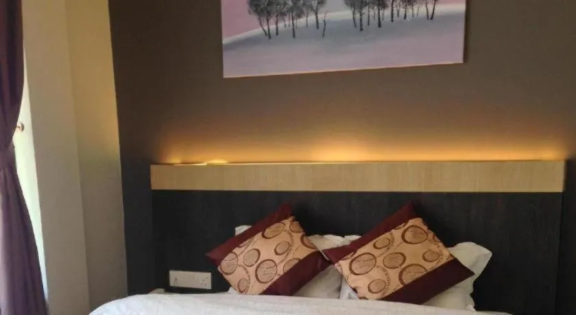 Bed in Lot 10 Boutique Hotel