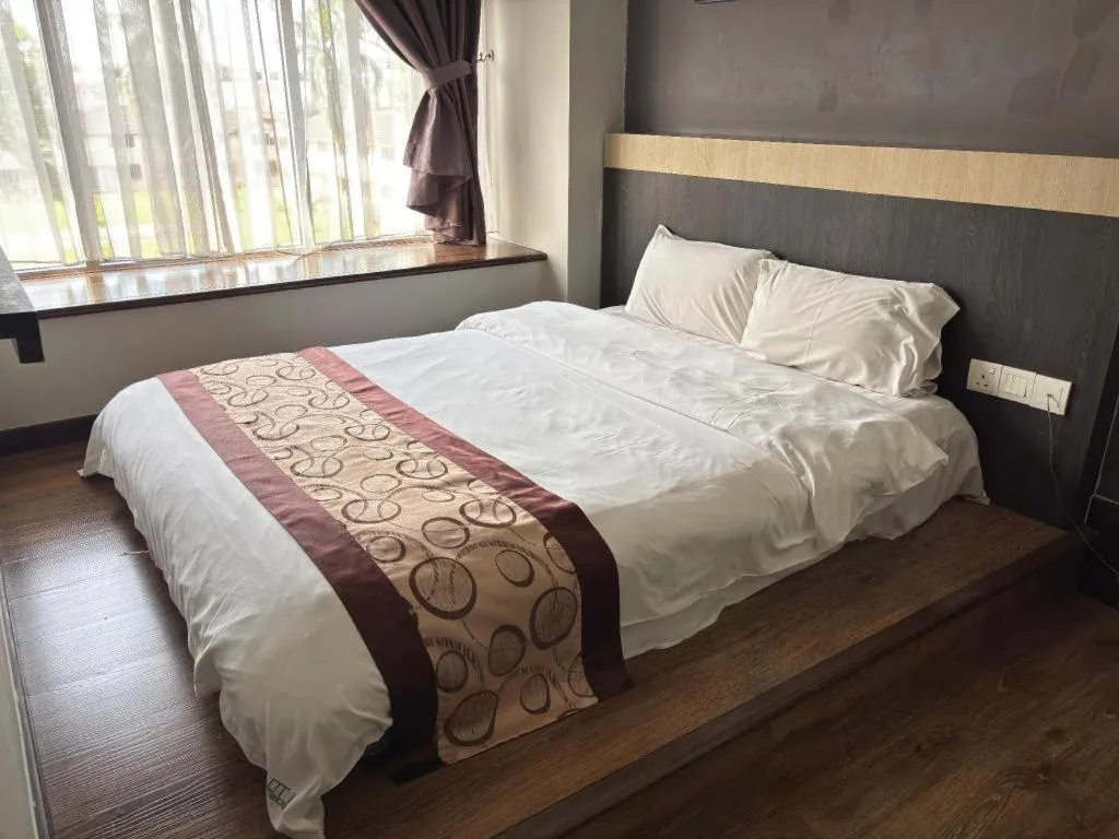 Bed in Lot 10 Boutique Hotel