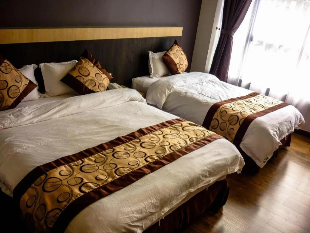 Bed in Lot 10 Boutique Hotel