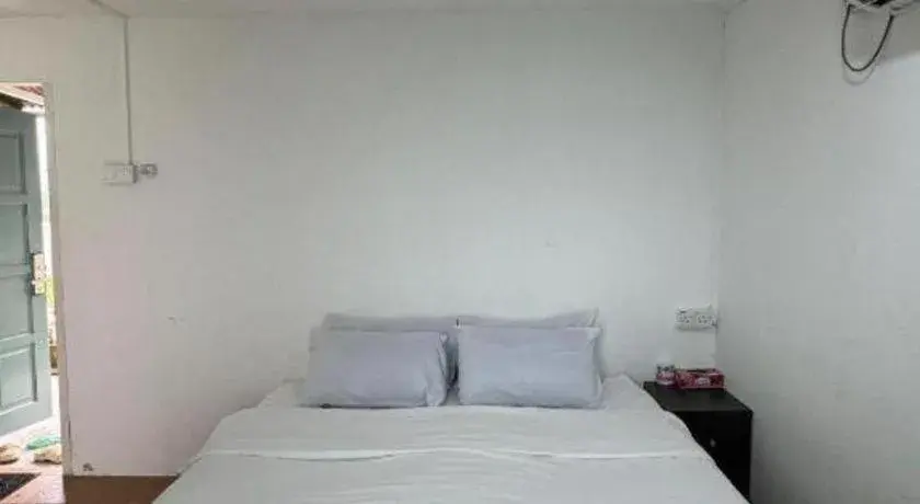 Bed in Rockbund Fishing Chalet Bed in Rockbund Fishing Chalet