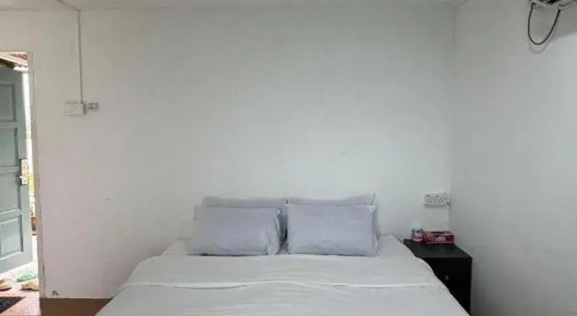 Bed in Rockbund Fishing Chalet Bed in Rockbund Fishing Chalet