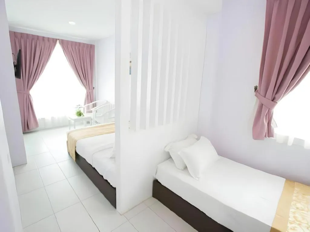 Bed in Skyview Hotel