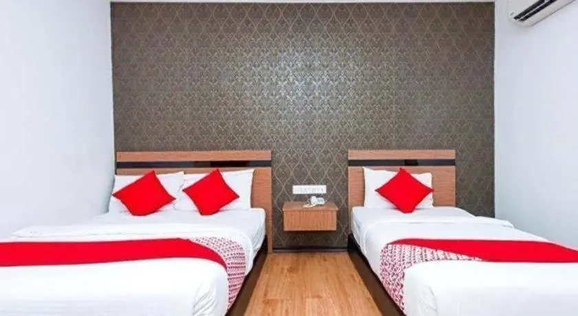 Bed in Hotel Aromas Kulai