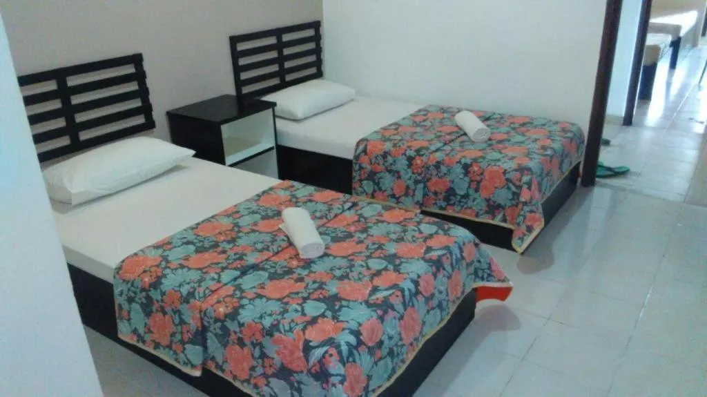 Bed in Hotel Mansya
