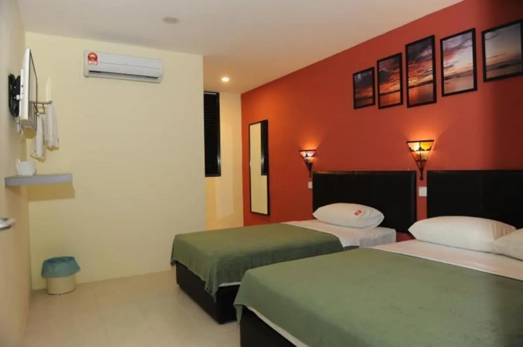 Bed in Kuok Pin Hotel