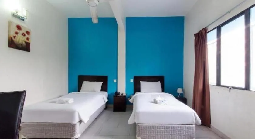 Bed in Hotel Grand Mutiara