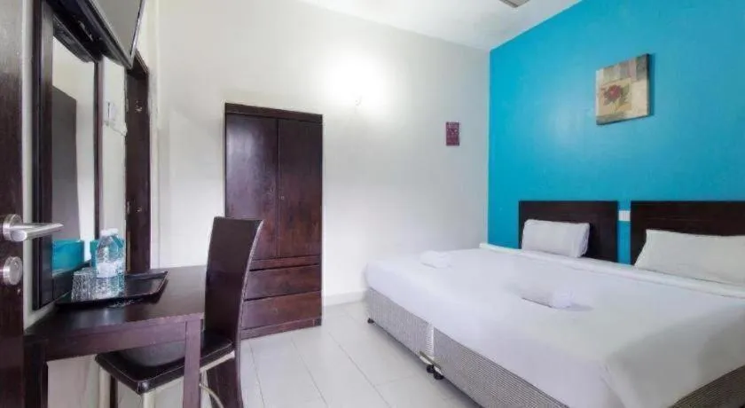 Bed in Hotel Grand Mutiara