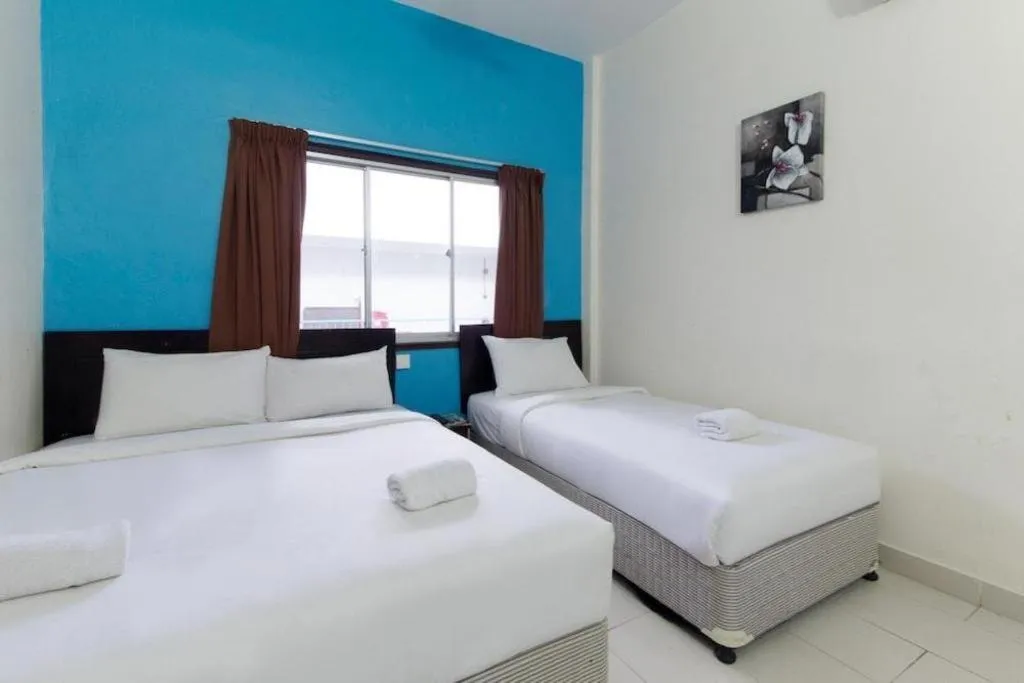 Bed in Hotel Grand Mutiara