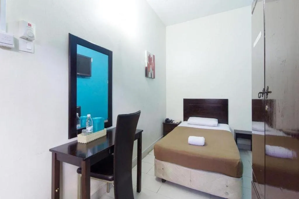 Bed in Hotel Grand Mutiara