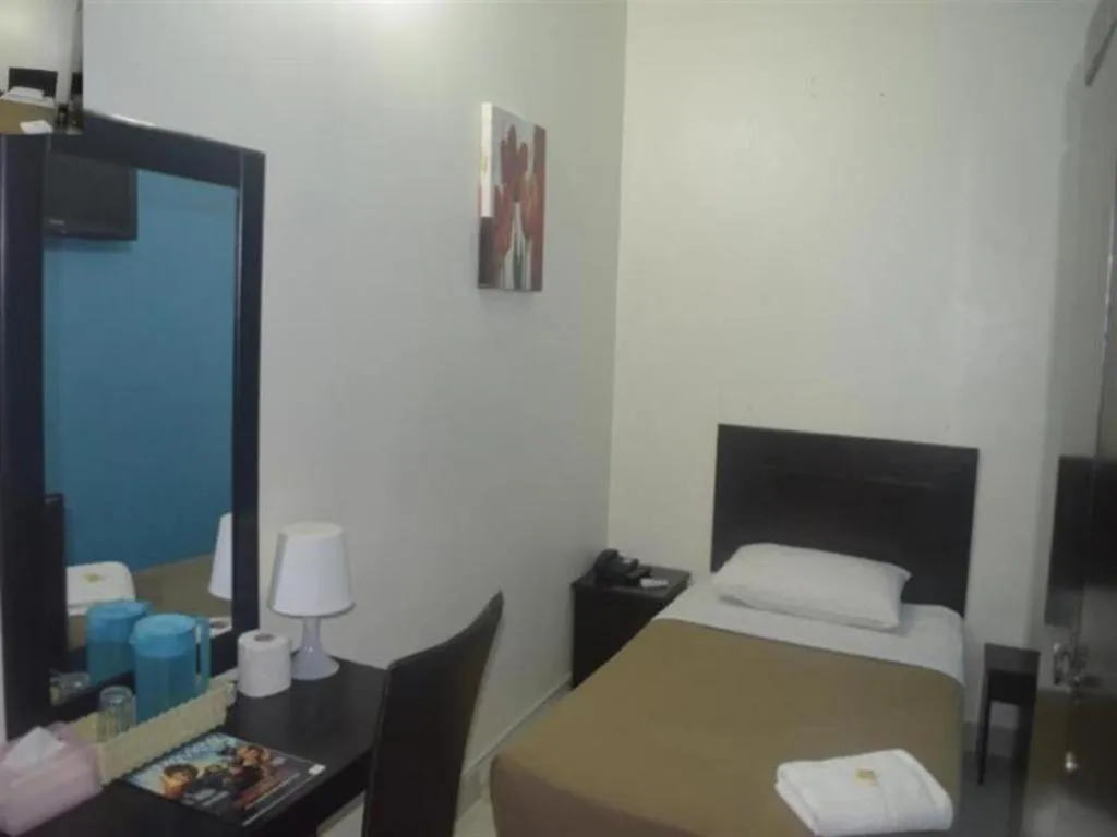 Bed in Hotel Grand Mutiara