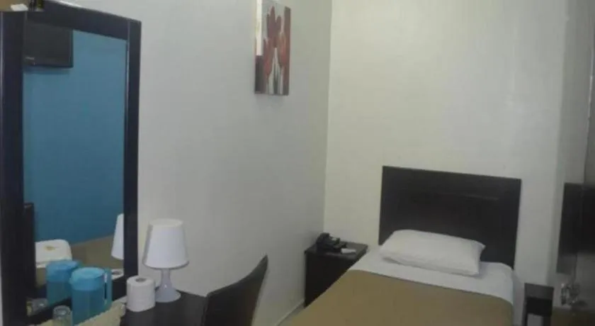 Bed in Hotel Grand Mutiara