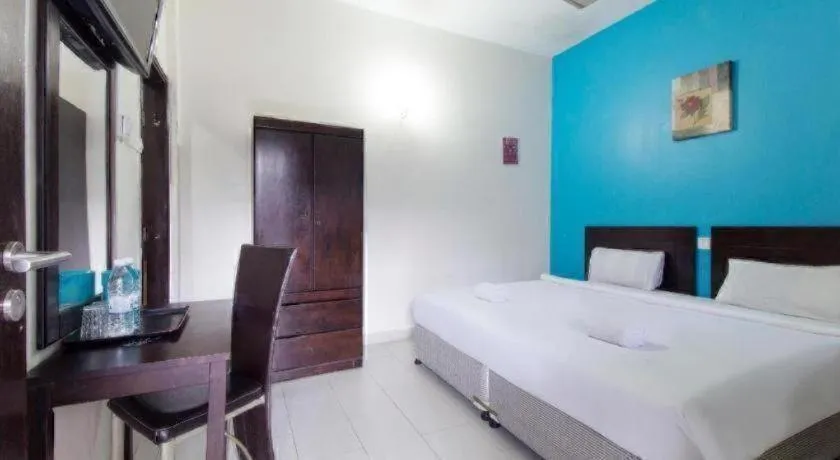 Bed in Hotel Grand Mutiara