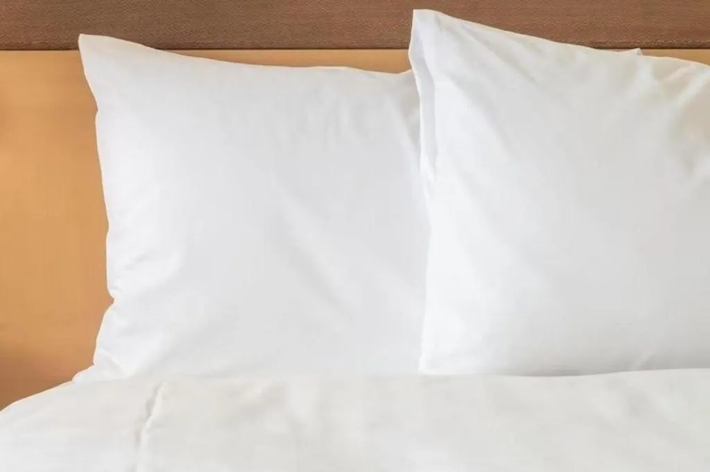 Bed in Kingwood Boutique Hotel