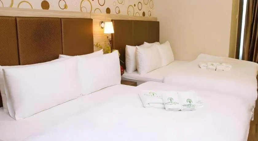 Bed in Tropicana Boutique Hotel