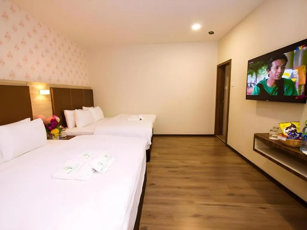 Bed in Tropicana Boutique Hotel