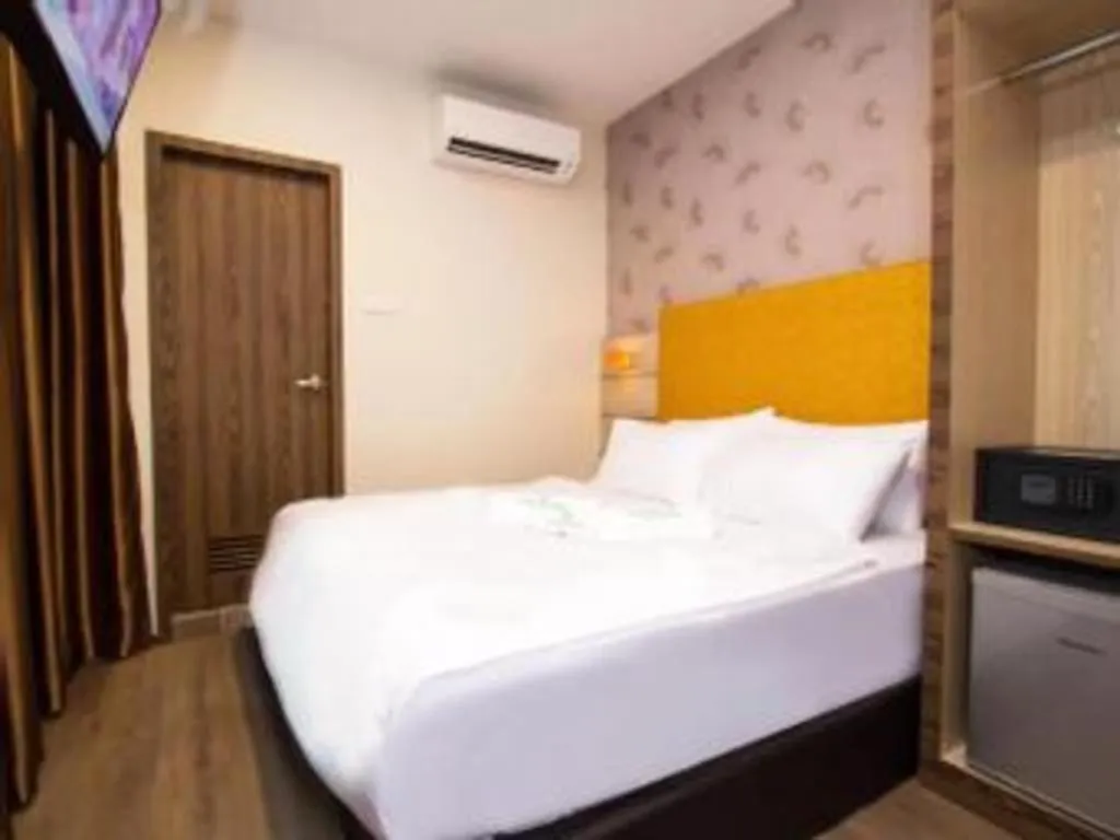 Bed in Tropicana Boutique Hotel