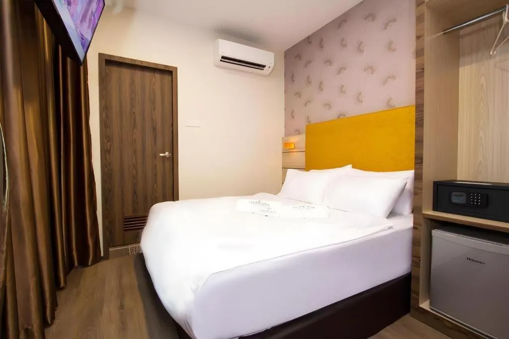 Bed in Tropicana Boutique Hotel