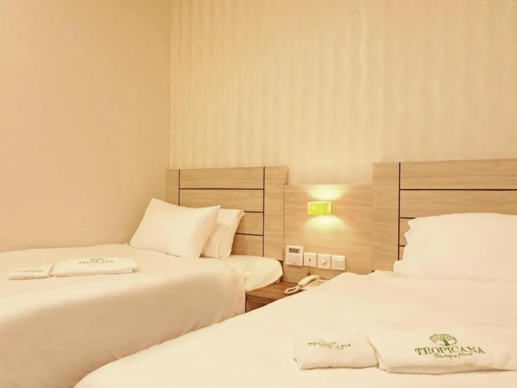 Bed in Tropicana Boutique Hotel