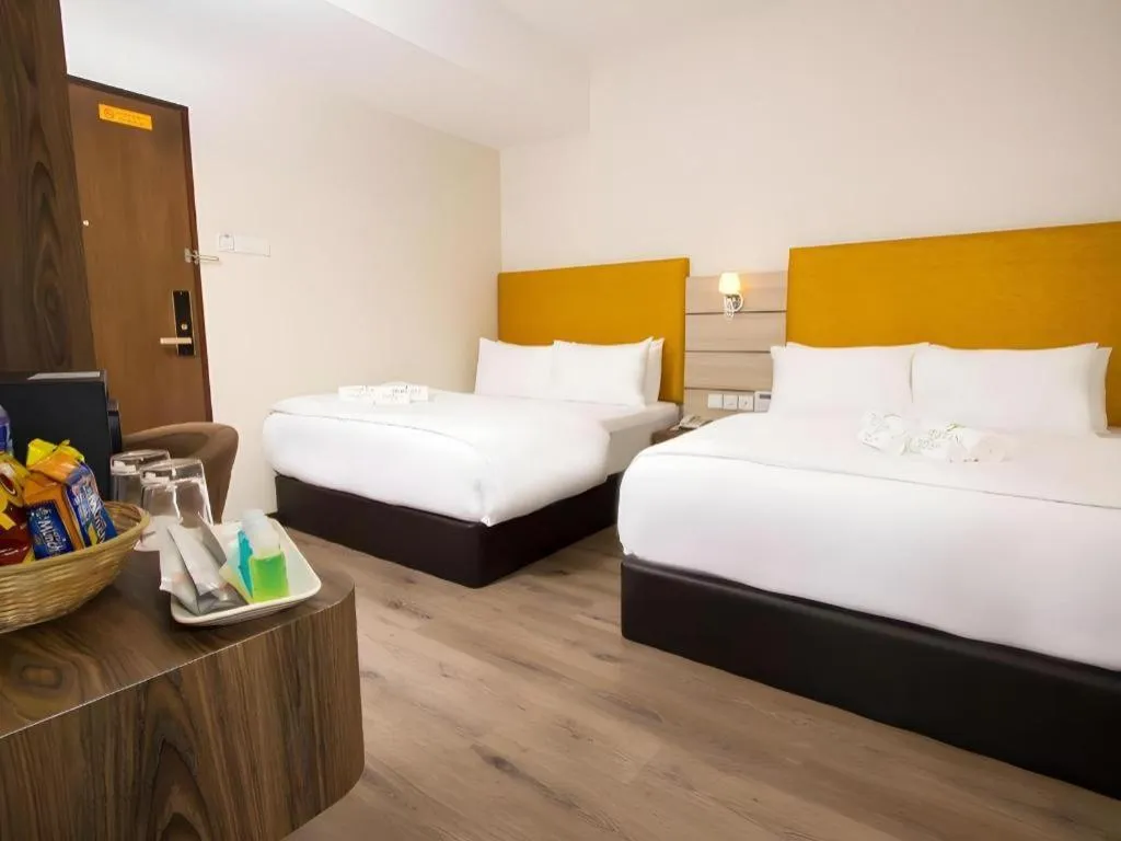 Bed in Tropicana Boutique Hotel