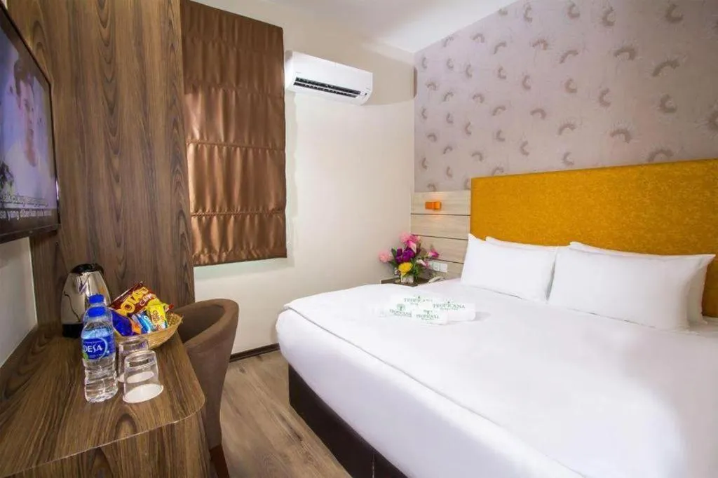 Bed in Tropicana Boutique Hotel