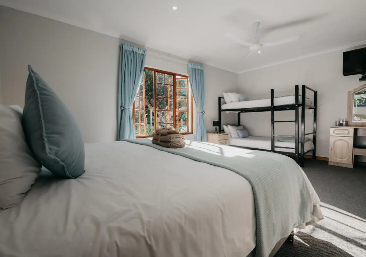 Photo of the whole room, Bed in The Village Lodge