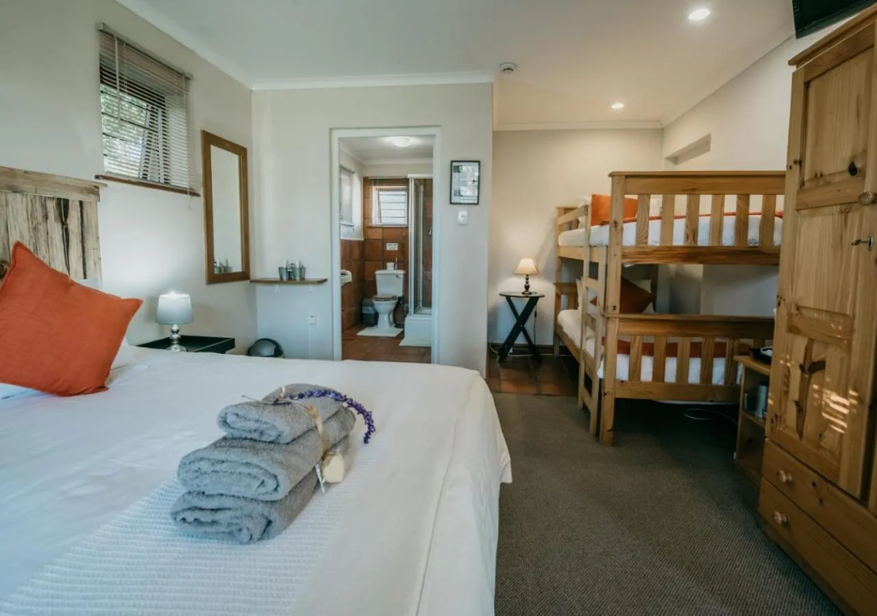 Photo of the whole room, Bed in The Village Lodge