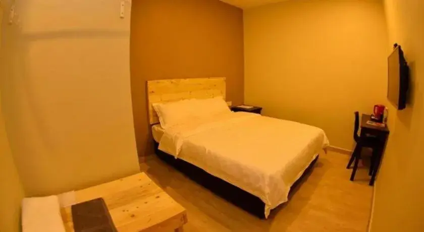 Bed in Sg. Paka Hotel Bed in Sg. Paka Hotel