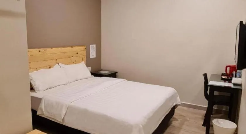 Bed in Sg. Paka Hotel