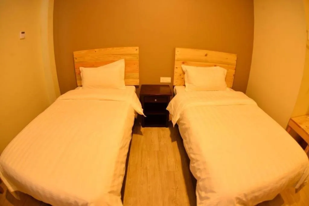 Bed in Sg. Paka Hotel