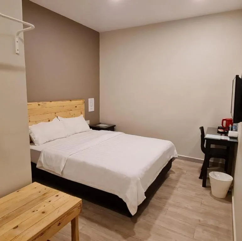 Bed in Sg. Paka Hotel