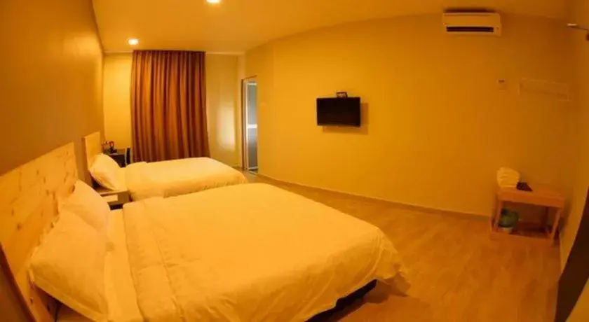 Bed in Sg. Paka Hotel Bed in Sg. Paka Hotel