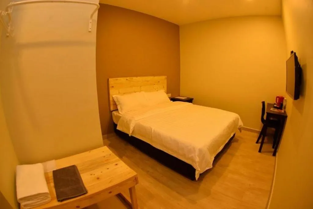 Bed in Sg. Paka Hotel