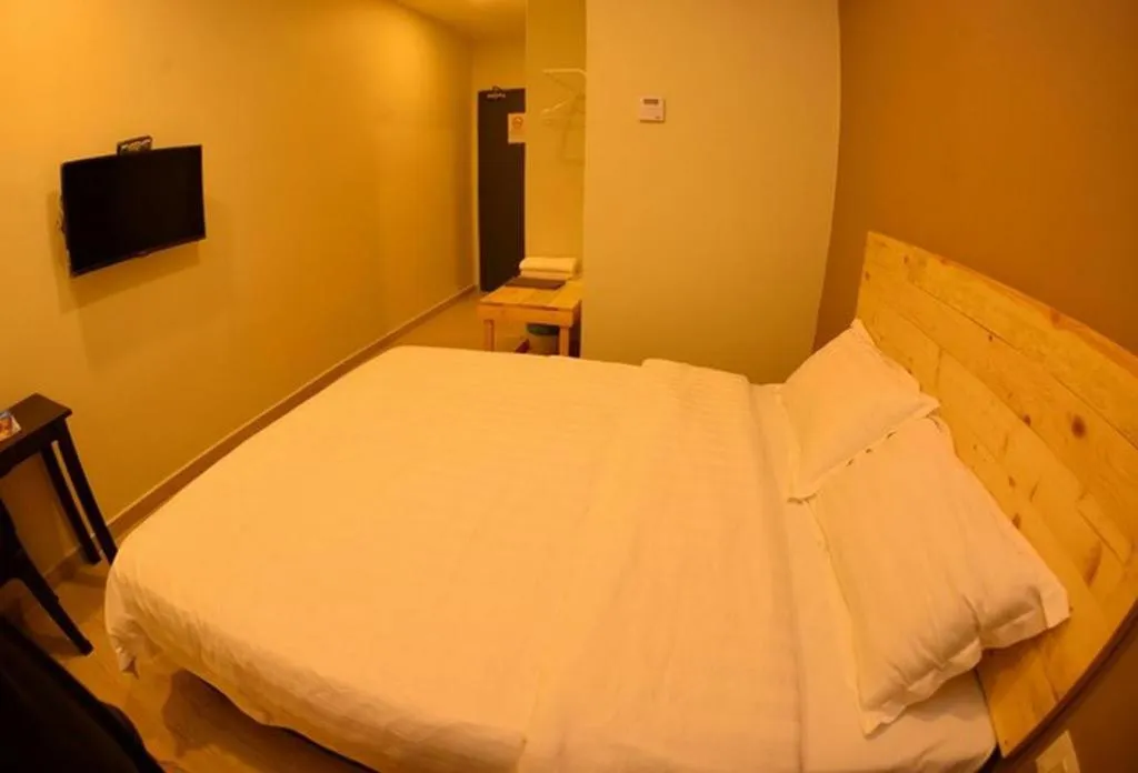 Bed in Sg. Paka Hotel