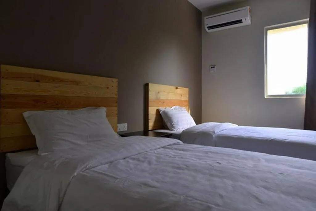 Bed in Sg. Paka Hotel