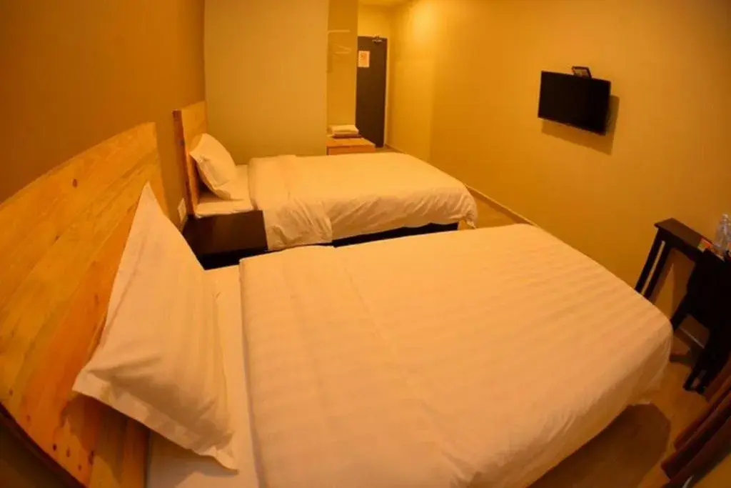 Bed in Sg. Paka Hotel Bed in Sg. Paka Hotel