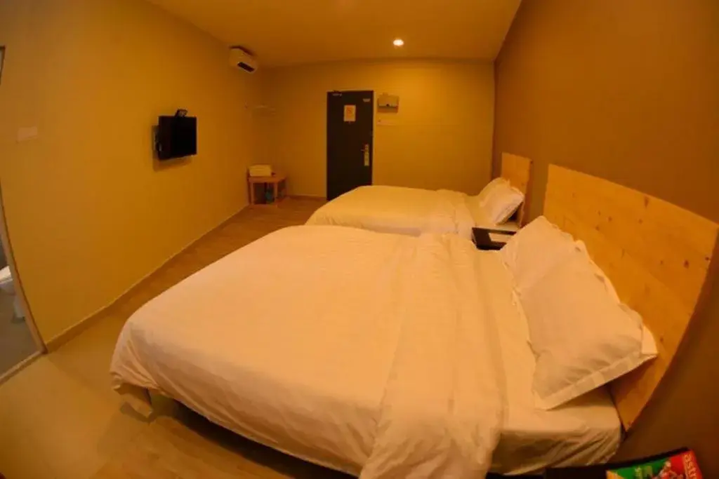 Bed in Sg. Paka Hotel Bed in Sg. Paka Hotel