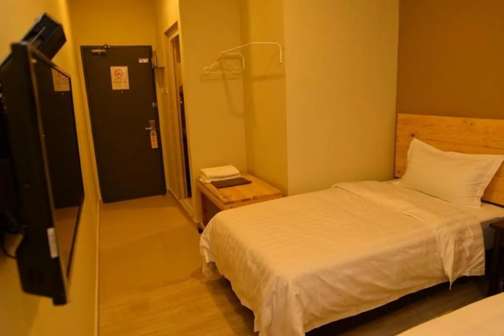 Bed in Sg. Paka Hotel