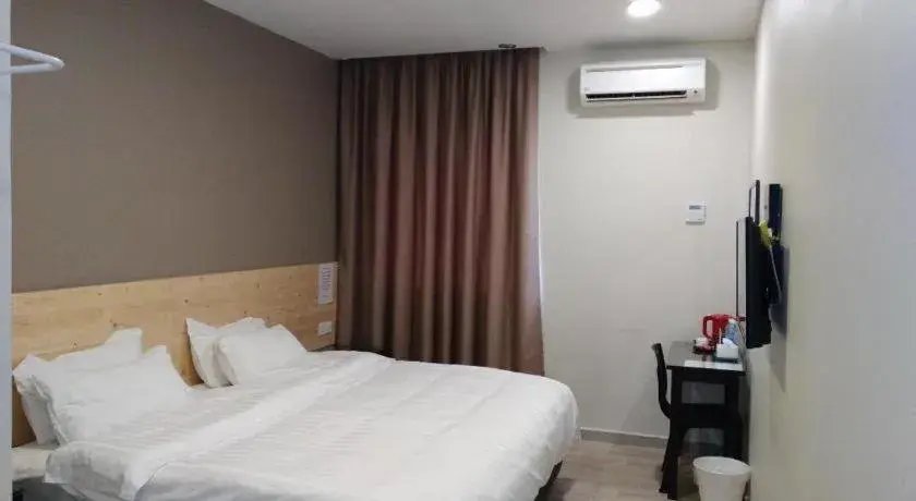 Bed in Sg. Paka Hotel Bed in Sg. Paka Hotel